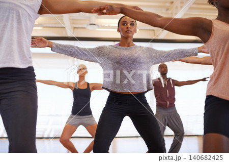Dancer, group and stretching at training in studio for workout, exercise or health for wellness. People, friends and together in dancing team for warm up, creative or balance in class, art or ballet 140682425