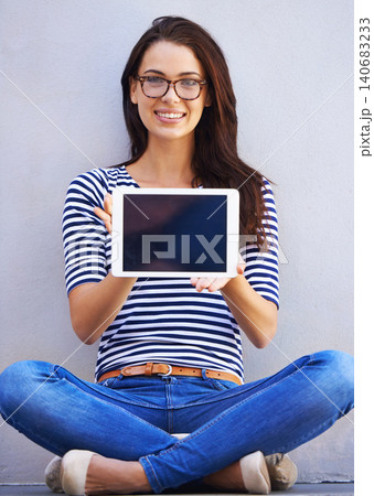 Young woman, portrait or tablet screen for display or technology on digital app for education by wall background. Student, smile or face with touchscreen for online research or connectivity to learn Young woman, portrait or tablet screen for display or technology on digital app for education by wall background. Student, smile or face with touchscreen for online research or connectivity to learn 140683233