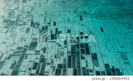 Drone view of algae seaweed farm in ocean water at Lembongan island in Indonesia 140683491