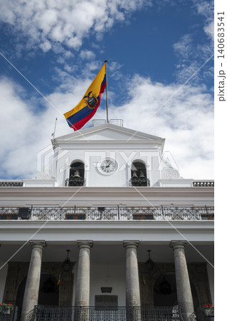 Facade of the Government Palace of Ecuador, commonly known as Carondelet, with an Ecuadorian flag waving. Facade of the Government Palace of Ecuador, commonly known as Carondelet, with an Ecuadorian flag waving. 140683541
