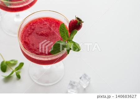Strawberry frose frozen cocktail drink with mint and ice Strawberry frose frozen cocktail drink with mint and ice 140683627