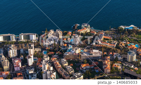 Aerial view of Funchal, Madeira coast with hotels and ocean pools Aerial view of Funchal, Madeira coast with hotels and ocean pools 140685033