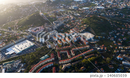 Aerial view of Madeira Island neighborhood with church and retail zones 140685039