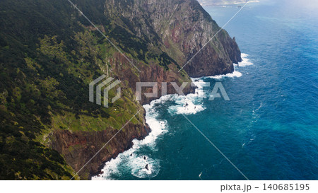 Aerial view of Madeira sea cliffs near Cabo Girao with laurel forest Aerial view of Madeira sea cliffs near Cabo Girao with laurel forest 140685195