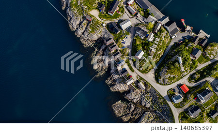 Aerial View of Lofoten Islands Coastal Village with Rocky Shoreline and Modern Houses 140685397
