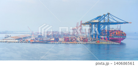 Jeddah, Saudi Arabia - Mar 08 2023,  panoramic aerial view, A large container ship "ONE" is unloading in the port of Jeddah, Saudi Arabia 140686561