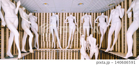 Naked mannequins stand in the interior of an abandoned clothing store, Jeddah, Saudi Arabia 140686591