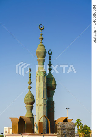 Jeddah, Saudi Arabia- Mar 08 2023, Minaret tops at Douar Kharjiya Roundabout - Al Bayya Square, at daytime, Jeddah, Saudi Arabia Jeddah, Saudi Arabia- Mar 08 2023, Minaret tops at Douar Kharjiya Roundabout - Al Bayya Square, at daytime, Jeddah, Saudi Arabia 140686604