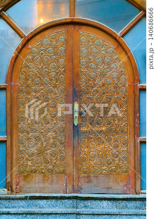 View of curious looking door in old town of Jeddah, Saudi Arabia, at daytime View of curious looking door in old town of Jeddah, Saudi Arabia, at daytime 140686666
