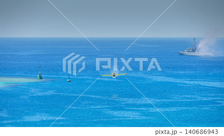 Yanbu, Saudi Arabia - Mar 16 2023, the yellow plane, Air Tractor, flying in the sky at daytime, Yanbu, Saudi Arabia 140686943