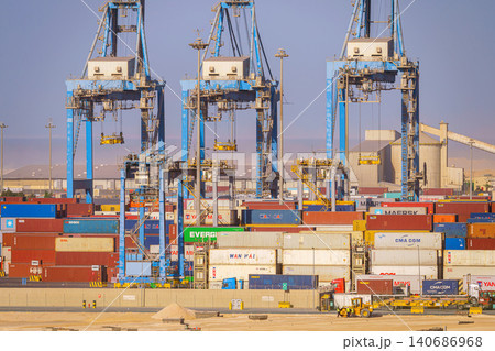 Ain Sokhna, Egypt - Mar 18 2023, Aerial panoramic view of the port with containers, cranes and ships, Ain Sokhna, Egypt Ain Sokhna, Egypt - Mar 18 2023, Aerial panoramic view of the port with containers, cranes and ships, Ain Sokhna, Egypt 140686968