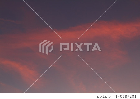 Dramatic red and orange sky and clouds abstract background. Red-orange clouds on sunset sky. Warm weather background. Art picture of sky at dusk Dramatic red and orange sky and clouds abstract background. Red-orange clouds on sunset sky. Warm weather background. Art picture of sky at dusk 140687281