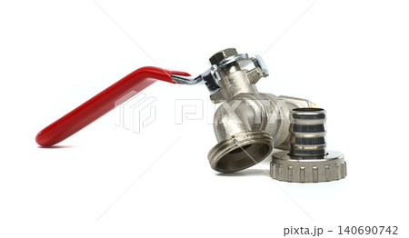 Shiny metal ball valve with red handle and hose connector on white background 140690742