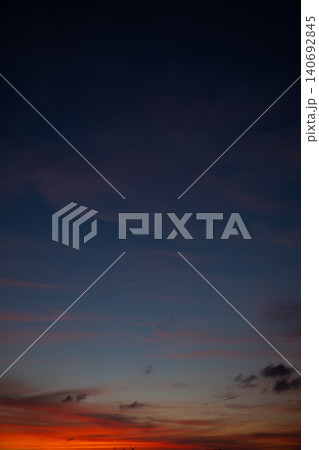 Clouds fill the Bali sky at sunset, showing vibrant colors Clouds fill the Bali sky at sunset, showing vibrant colors 140692845
