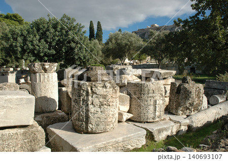 Ancient archaeological ruins with the Acropolis of Athens in the background 140693107