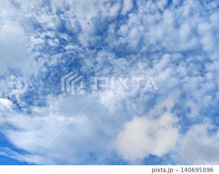 sunny day with blue sky with white clouds 140695896