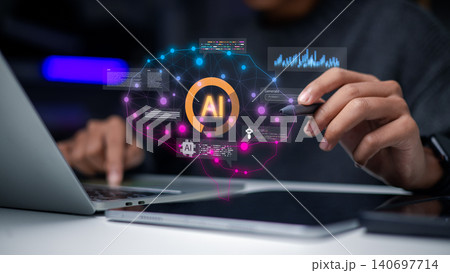 Professional hand holding stylus pen interacting with artificial intelligence brain hologram, machine learning nodes, and digital data graphs over a laptop in office. 140697714