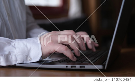 White Shirt Hands Typing On Laptop, Office Tone With Formal Sleeve, Composing Business Email And Report, Focused Professional Environment, Corporate Communication And Document Preparation White Shirt Hands Typing On Laptop, Office Tone With Formal Sleeve, Composing Business Email And Report, Focused Professional Environment, Corporate Communication And Document Preparation 140700484