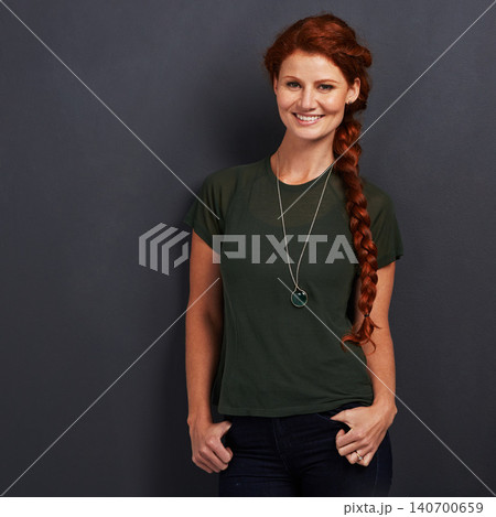 Portrait, ginger and happy woman in studio for fashion isolated on dark background mockup space. Confidence, smile and person with red hair in casual clothes, tshirt or stylish on backdrop in Ireland 140700659