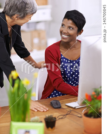 Businesswomen, computer or talk of diversity in business, discussion or exchange of ideas on project. Mentor, women or desktop as tech in support, training or communication to solve questions online 140700845