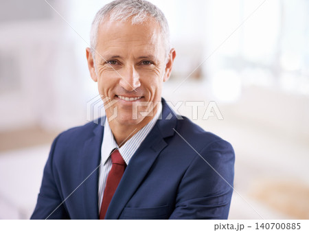 Smile, portrait and mature businessman, boss or senior manager at corporate startup office. Relax, confidence and happy face of business owner, CEO or entrepreneur at professional agency with pride 140700885