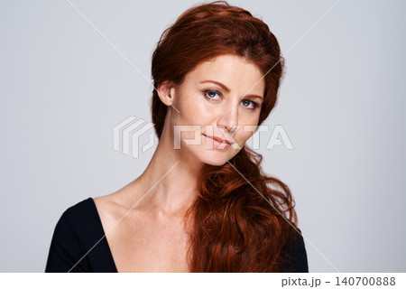 Portrait, beauty and hair with woman in studio isolated on white background for natural wellness. Face, salon and skincare confident red head model at spa for keratin or dermatology treatment Portrait, beauty and hair with woman in studio isolated on white background for natural wellness. Face, salon and skincare confident red head model at spa for keratin or dermatology treatment 140700888