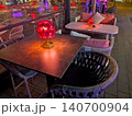 Outdoor Restaurant Terrace With Red Flower Lamps At Night 140700904
