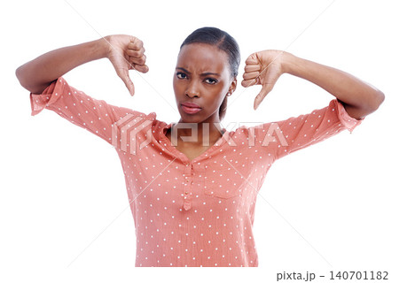 Black woman, portrait and thumbs down for disagreement or feedback, no and dislike emoji on white background. Review, vote and advice for mistake, hand gesture and negative news with fail in studio Black woman, portrait and thumbs down for disagreement or feedback, no and dislike emoji on white background. Review, vote and advice for mistake, hand gesture and negative news with fail in studio 140701182