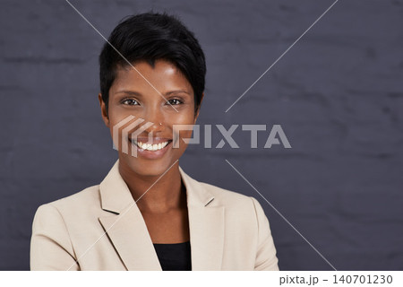 Indian woman, portrait and professional in business with smile, pride and ambition with confidence on wall background. Happy in corporate career, job satisfaction and real estate agent in Mumbai Indian woman, portrait and professional in business with smile, pride and ambition with confidence on wall background. Happy in corporate career, job satisfaction and real estate agent in Mumbai 140701230