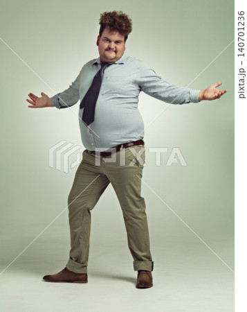 Plus size, arms and portrait of man, excited and happiness with energy in studio with background. Adult, male person and guy with confidence, professional and employee with smile, joy and positive Plus size, arms and portrait of man, excited and happiness with energy in studio with background. Adult, male person and guy with confidence, professional and employee with smile, joy and positive 140701236