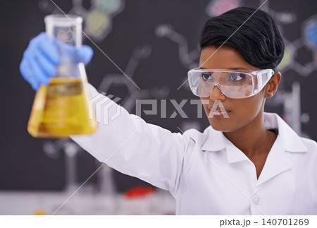 Science, laboratory and black woman with sample in beaker for medical research, analysis and vaccine development. Healthcare, pharmaceutical and person with vial for medicine, experiment and study Science, laboratory and black woman with sample in beaker for medical research, analysis and vaccine development. Healthcare, pharmaceutical and person with vial for medicine, experiment and study 140701269