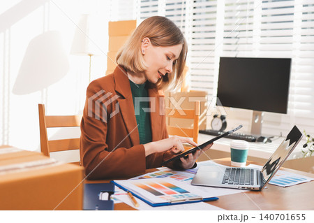 Fashion designer woman and typing on laptop in shop for email project or online order of fabric in creative startup Serious tailor computer and small business for clothes or textile in : Generative AI Fashion designer woman and typing on laptop in shop for email project or online order of fabric in creative startup Serious tailor computer and small business for clothes or textile in : Generative AI 140701655