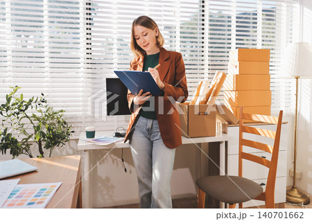Fashion designer woman and typing on laptop in shop for email project or online order of fabric in creative startup Serious tailor computer and small business for clothes or textile in : Generative AI 140701662