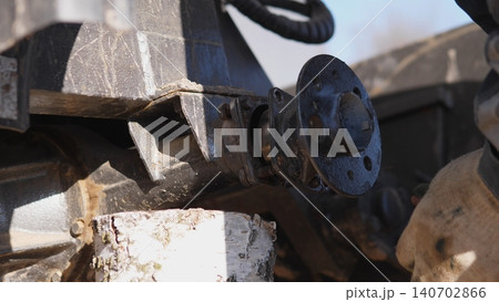 Concrete Mixer Mechanism With Valve And Flange, Closeup On Gearbox, Bolts And Worn Metal Surfaces, Grease And Signs Of Abrasion Visible, Industrial Component Detail For Maintenance 140702866