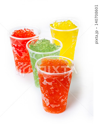 Colorful Frozen Slush Drinks in Plastic Cups Colorful Frozen Slush Drinks in Plastic Cups 140708601
