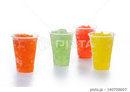 Colorful Frozen Slush Drinks in Plastic Cups Colorful Frozen Slush Drinks in Plastic Cups 140708607