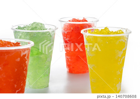 Colorful Frozen Slush Drinks in Plastic Cups Colorful Frozen Slush Drinks in Plastic Cups 140708608