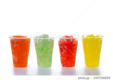 Colorful Frozen Slush Drinks in Plastic Cups Colorful Frozen Slush Drinks in Plastic Cups 140708609