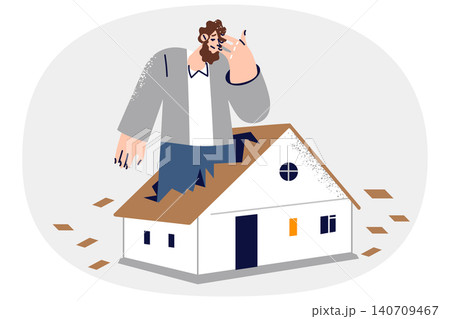 Man worried about insufficient size of housing, stands inside fire in broken roof of small house 140709467