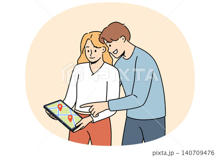 Digital maps are used by man and woman to plot route while traveling to new city. Digital maps are used by man and woman to plot route while traveling to new city. 140709476