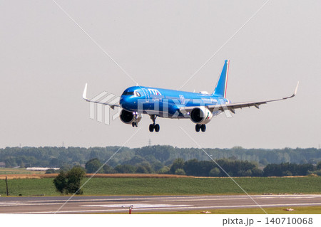 ITA Airways Airbus A320neo airplane landing on runway ITA Airways Airbus A320neo airplane landing on runway 140710068