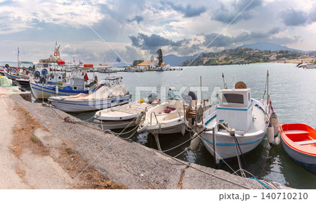 Fishing Boats and Vlacherna Monastery in Lagoon of Corfu Island Greece Panorama Fishing Boats and Vlacherna Monastery in Lagoon of Corfu Island Greece Panorama 140710210