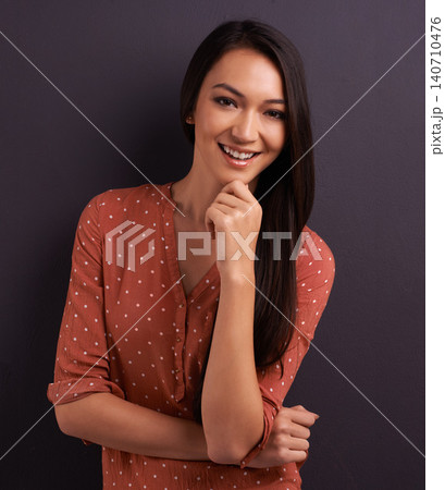 Thinking, smile and portrait of woman with idea in studio, laughing and remember memory isolated on a grey background with glasses. Face, happy person and inspiration for decision, vision or planning Thinking, smile and portrait of woman with idea in studio, laughing and remember memory isolated on a grey background with glasses. Face, happy person and inspiration for decision, vision or planning 140710476
