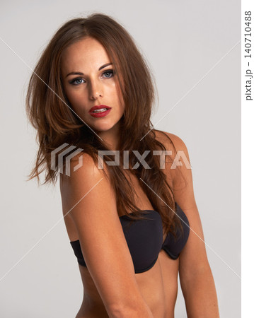 Portrait, woman or red lipstick in beauty, hair care or cosmetology in studio on white background. Sexy, confident or female person in glow, flawless skin or luxury makeup for designer hairstyle Portrait, woman or red lipstick in beauty, hair care or cosmetology in studio on white background. Sexy, confident or female person in glow, flawless skin or luxury makeup for designer hairstyle 140710488