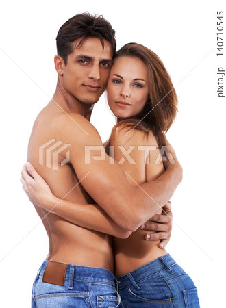Couple, hug and topless with skin in studio for touch on white background with passionate, love and sensual together. Portrait, relationship and support with care, sexy and embrace with desire. Couple, hug and topless with skin in studio for touch on white background with passionate, love and sensual together. Portrait, relationship and support with care, sexy and embrace with desire. 140710545