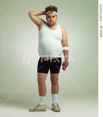 Man, portrait and dumbbell in studio for workout, plus size and exercise for weight loss on background. Male person, training and gym equipment for health, challenge and body development for fitness Man, portrait and dumbbell in studio for workout, plus size and exercise for weight loss on background. Male person, training and gym equipment for health, challenge and body development for fitness 140710553