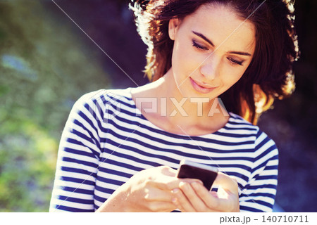Woman, cellphone or social media for connectivity in city, nature or search for travel app to download. Young person, smartphone or scroll online for networking or reading message for update in town 140710711