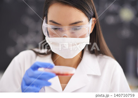 Scientist, mask and woman with petri dish for blood analysis, experiment or research in laboratory. Science, glasses and medical professional with culture plate, study and inspection for dna test Scientist, mask and woman with petri dish for blood analysis, experiment or research in laboratory. Science, glasses and medical professional with culture plate, study and inspection for dna test 140710759
