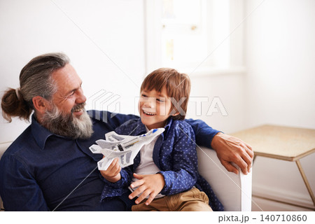 Dad, son and play with toy, airplane and fun in home or house with joy. Father, child and happiness with smile, youth and childhood development for future growth and bonding or single parent care Dad, son and play with toy, airplane and fun in home or house with joy. Father, child and happiness with smile, youth and childhood development for future growth and bonding or single parent care 140710860