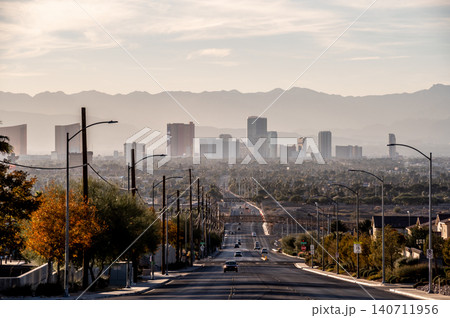 Las Vegas Nevada Skyline with Stratosphere Tower and Desert Mountain Backdrop from Daylight Las Vegas Nevada Skyline with Stratosphere Tower and Desert Mountain Backdrop from Daylight 140711956